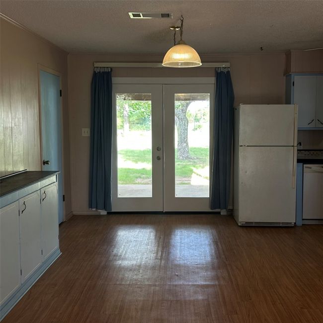 View of the french doors from inside the kitchen | Image 7