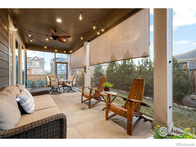 Back patio is complete with retractable sunshades | Image 26