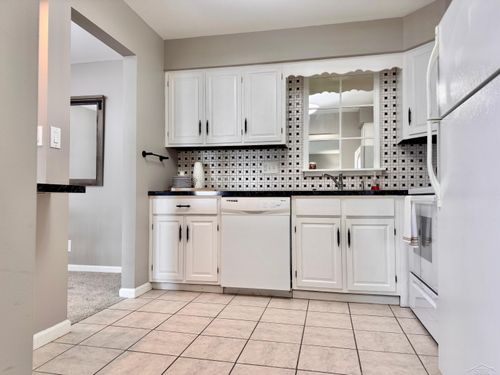 202 Provincial Ct, Saginaw, MI, 48638-6135 | Card Image