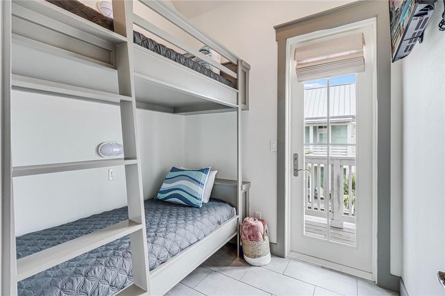 Upstairs Bunk Room with Private Patio | Image 14
