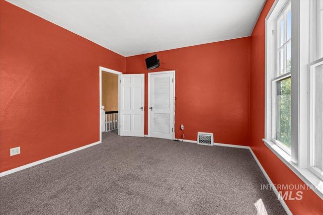 Unfurnished bedroom featuring carpet and baseboards | Image 43