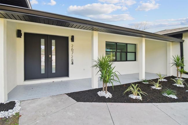 26728 Hickory Loop, House other with 3 bedrooms, 2 bathrooms and null parking in LUTZ FL | Image 51
