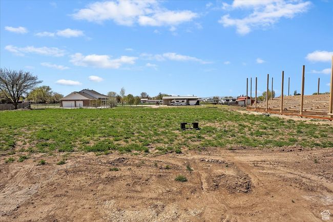 View of yard with fence and a garage | Image 20