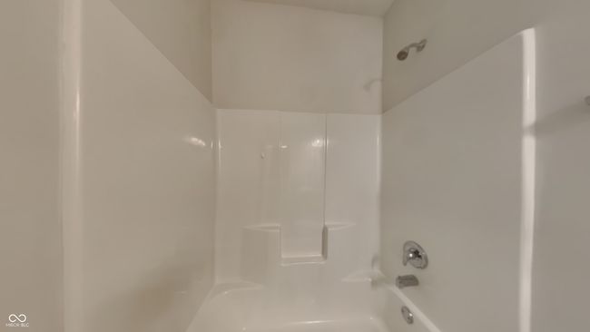 bathroom featuring a shower | Image 14