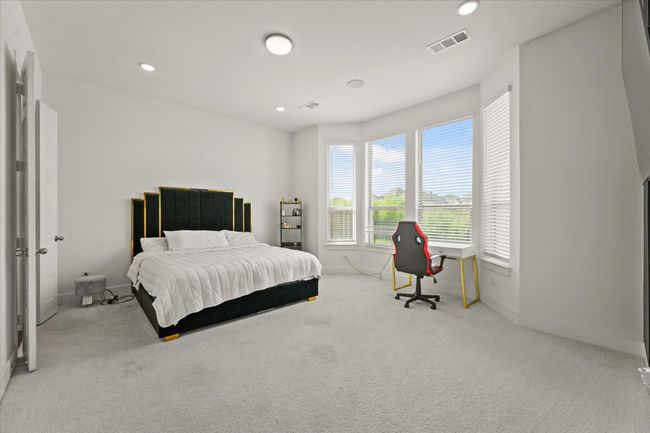 Bedroom featuring carpet flooring and recessed lighting | Image 13
