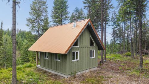 925 Yelping Coyote Run, Trego, MT, 59934 | Card Image