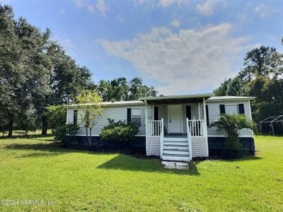 115 Tall Timbers Trail, House other with 3 bedrooms, 2 bathrooms and null parking in Palatka FL | Image 1