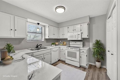 6902 N Fisk Ave, Kansas City, MO, 64151-1659 | Card Image