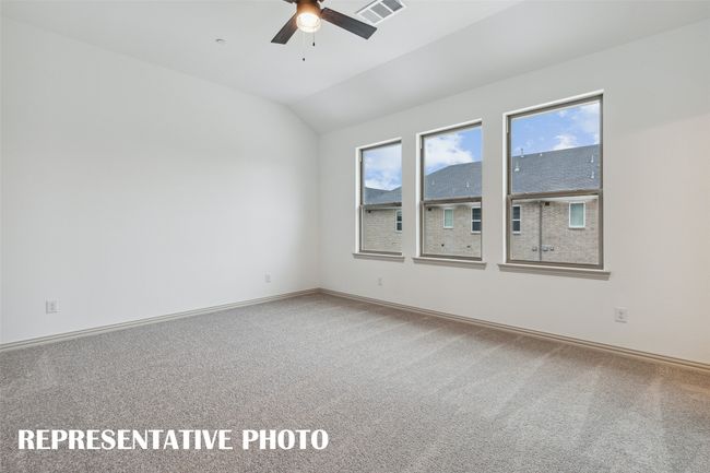 An owner's suite that offers gorgeous finishes, high ceilings, tons of natural light....our Boyd floor plan has it all! REPRESENTATIVE PHOTO | Image 11