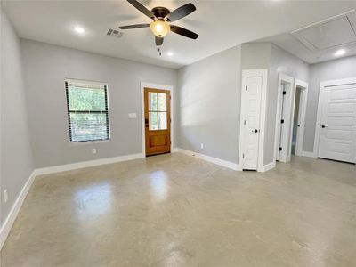 Empty room featuring ceiling fan | Image 3