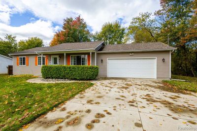 11199 N Lewis Road, Home with 3 bedrooms, 1 bathrooms and null parking in Thetford Twp MI | Image 2