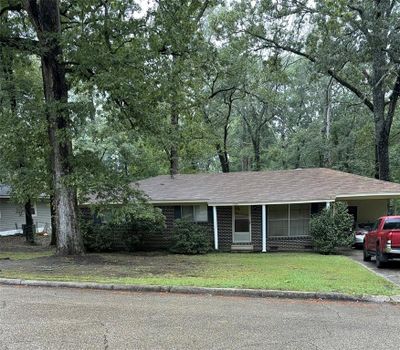 Ranch-style home with a front yard | Image 1