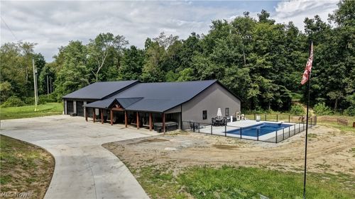 6168 Buckeye Hollow Rd Se, Uhrichsville, OH, 44683-1334 | Card Image