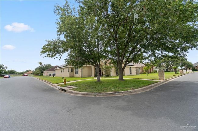 View of front of house featuring a residential view and a front yard | Image 23