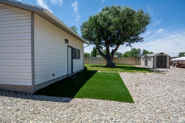 View of yard featuring a shed | Image 4