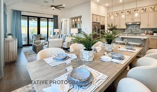 Dining area featuring wood finished floors, recessed lighting, and a ceiling fan | Image 15