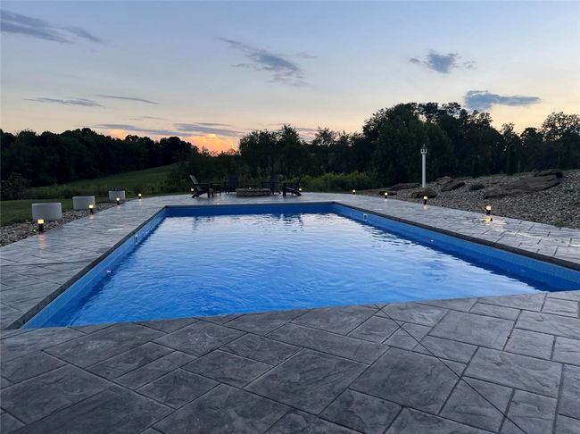Heated salt water pool with electric safety cover. | Image 35