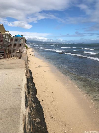 Sandy Beach on your 55 linear ocean front property with approved sea wall. See Diamond Head off in the distance? | Image 1