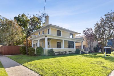 View of front facade with a porch and a front lawn | Image 2