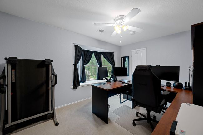 BR 4 is currently being used as an office and has a window bench at the bay windows | Image 28