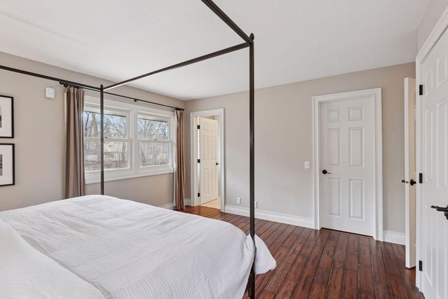 Master bedroom has fresh paint, hardwood floors, 2 closets, and is adjoins to Master bath. | Image 16