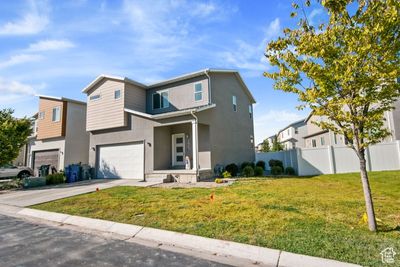 View of front of home featuring a garage and a front lawn | Image 3