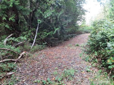 The driveway loops through your property so you don't have to back out! | Image 3