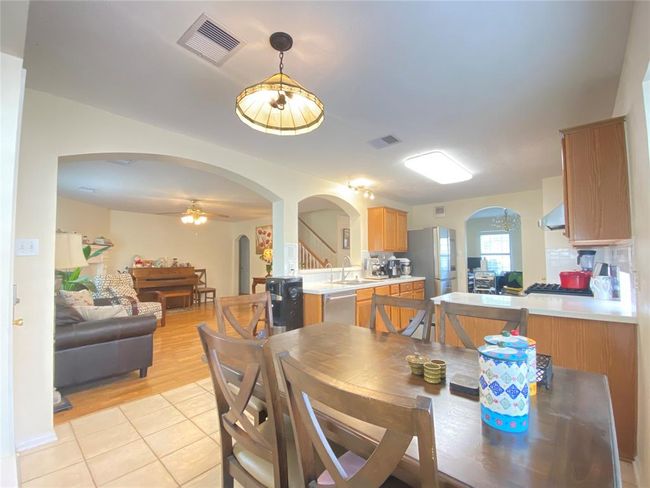 Open kitchen layout with easy access, a lot of natural light. | Image 11