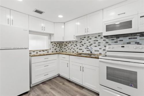 311-1855 W 60th St, Hialeah, FL, 33012-7512 | Card Image