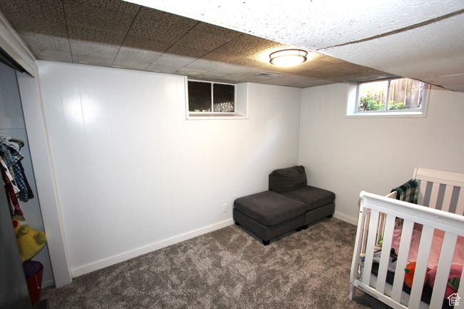 Bedroom featuring carpet floors and baseboards | Image 28