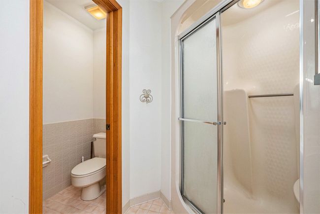 Primary bath shower and private toilet | Image 17