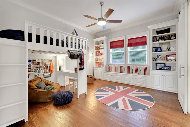 Mirroring the design and layout of the secondary bedroom down the hall, bedroom #5 continues the home’s refined aesthetic. So much storage! | Image 33