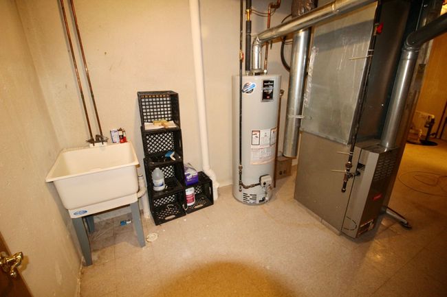 Basement includes sump pump. | Image 28