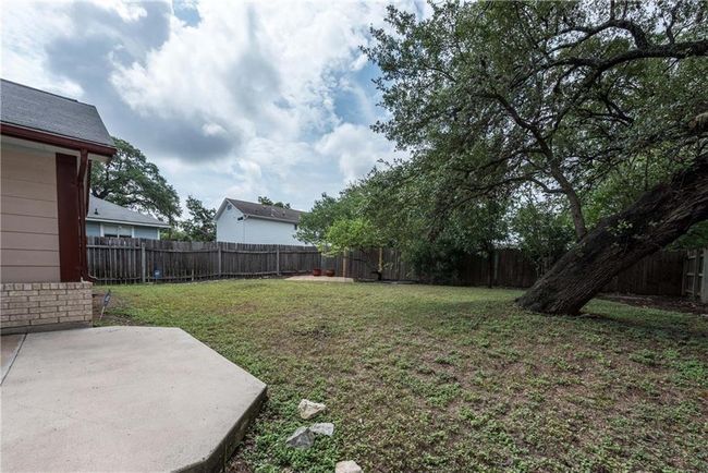 Fenced backyard featuring a patio area | Image 20