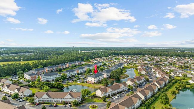 Aerial view of residential area with a nearby body of water | Image 28
