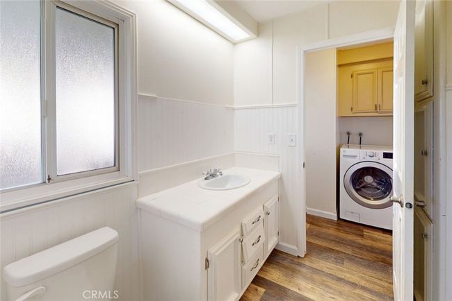 Jack & Jill bathroom leading to laundry. | Image 28