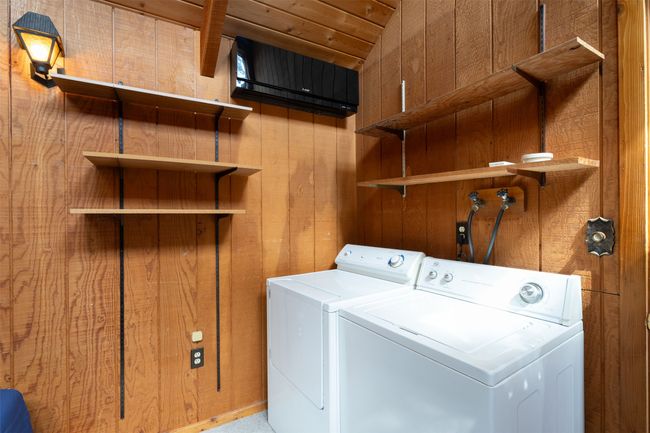 Main level bedroom with laundry and full bathroom | Image 33