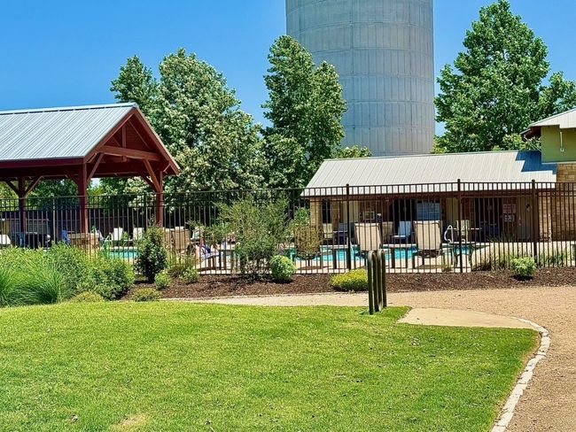 View of community featuring a swimming pool | Image 39