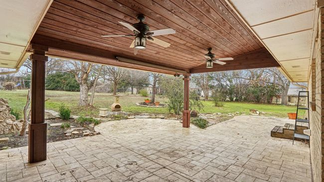 View of patio / terrace with a ceiling fan | Image 31