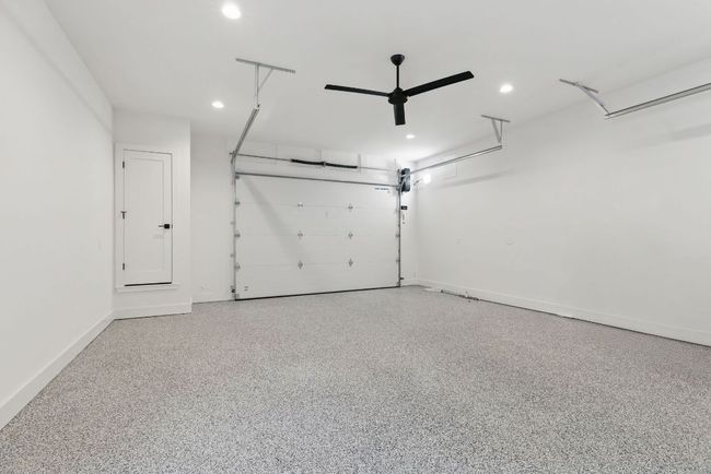 Garage with recessed lighting, ceiling fan, and baseboards | Image 27