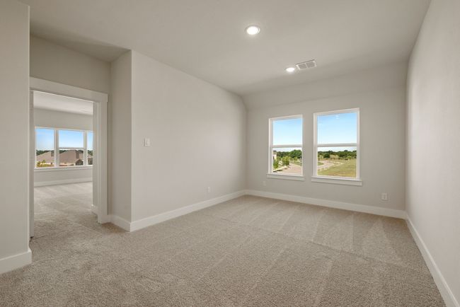 Upstairs you are greeted by a lovely loft space which is the perfect second family living area. | Image 13