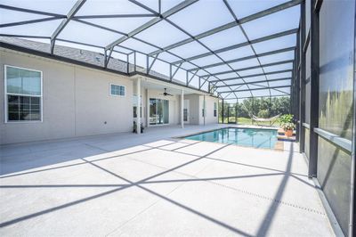 9702 Pepper Tree Place, House other with 4 bedrooms, 3 bathrooms and null parking in Wildwood FL | Image 2