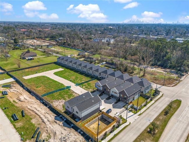 Aerial view of this rapidly growing community featuring modern new construction homes with spacious lots and future development opportunities. Conveniently located with easy access to major roads, shopping, and dining. | Image 31