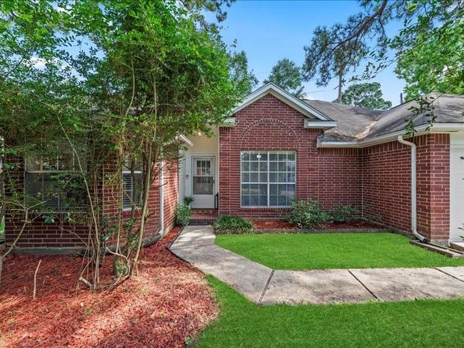 Welcome home to this delightful brick residence that radiates warmth and character from the moment you arrive. | Image 26