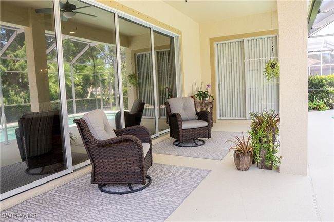 Screened Lanai overlooking golf to preserve views | Image 18