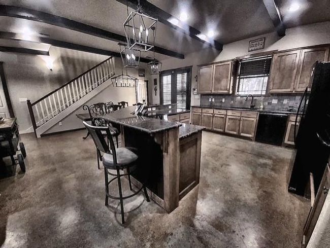 This kitchen is perfect for hosting gatherings with it's open concept | Image 4