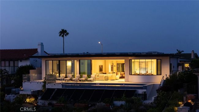 Evenings are as inspiring as daytime in this beautiful custom-lit home. | Image 38