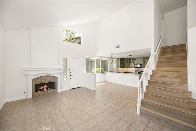 Spacious living area with fireplace | Image 7
