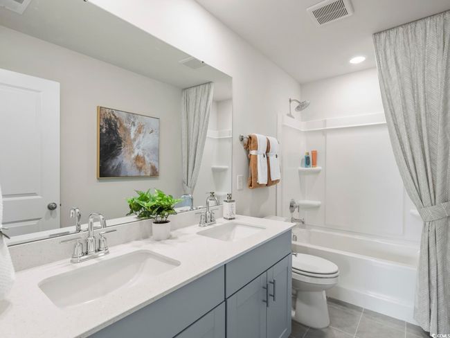 Photo is not of the actual home, but is an inspirational photo of builder’s model home. | Image 4