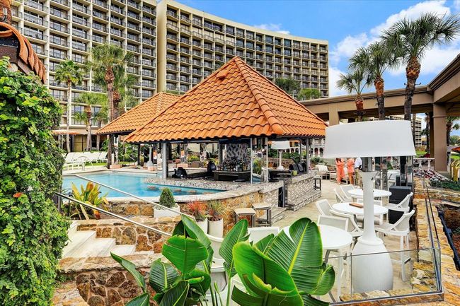 Take a sip or a dip in the pool at The Cove swim up bar. | Image 25